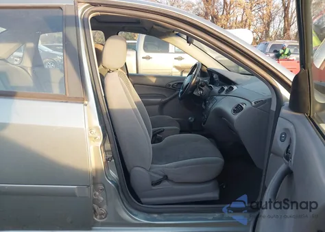 2003 Ford Focus Se z USA, uszkodzony, nr VIN 1FAFP34353W311314